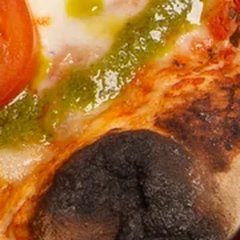 Close up of the charred spots on the crust