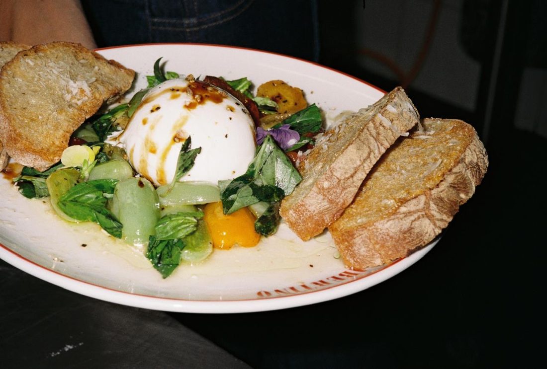 Burrata and bread on the table